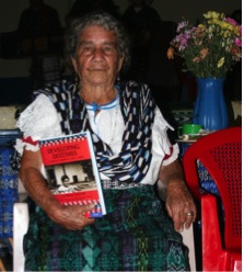 Mayan Midwife holding Developing Destinies book